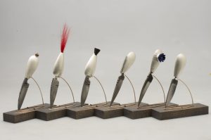 “Unsheathed”, six knives, sterling silver, steel,  fur, onyx, found object, wood, bronze, fabricated, 1 6cm high. 2013 (from Unsheathed, invitational exhibition.  Ontario Craft Council, Toronto, On)